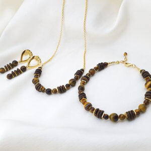 Conjunto de coco e olho de tigre folheado a ouro 18k. Semijoias artesanais feitas com pedras naturais de olho de tigre e coco,  entremeios e fechamentos folheados em ouro 18 k. Tamanho : Colar : 50 cm Brincos : 4 cm Pulseira: 20 cm