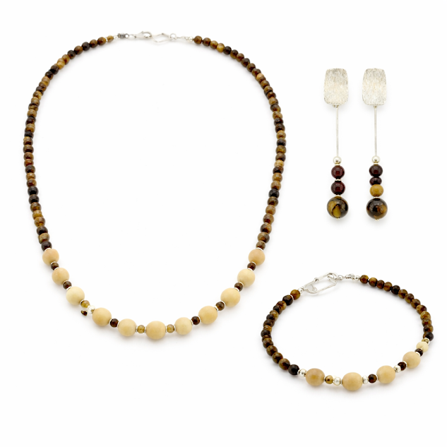conjunto de jarina e olho de tigre banhado a prata, peças unicas feitas a mão.