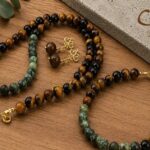 Conjunto de turquesa africana e olho de tigre banhado a ouro 18k. feito a mão pela ceci joias da amazonia